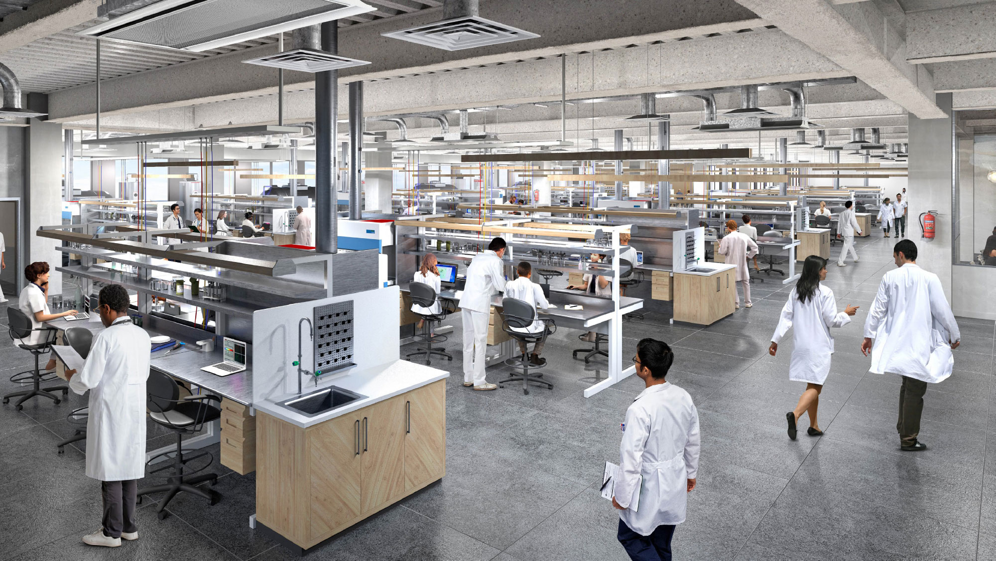 Scientists work in an open concept lab space